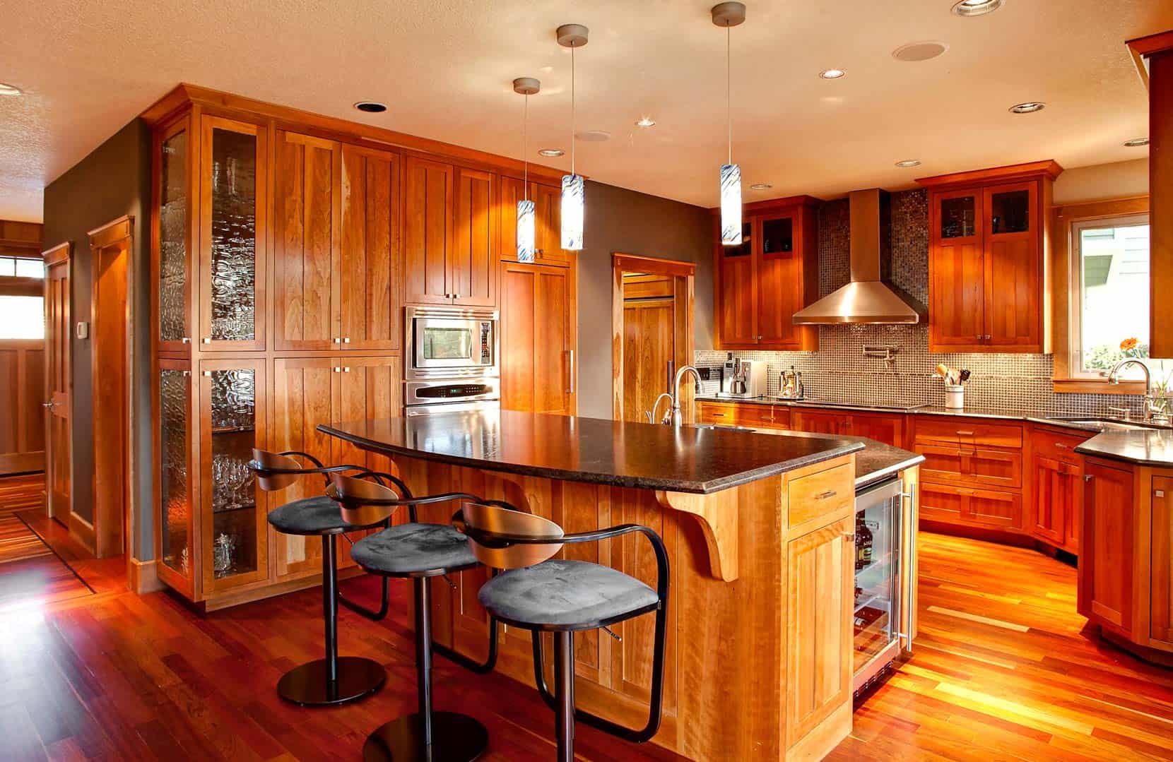 All all-wood kitchen features prominently in this photo showing a whole house remodel by Fazzolari construction.